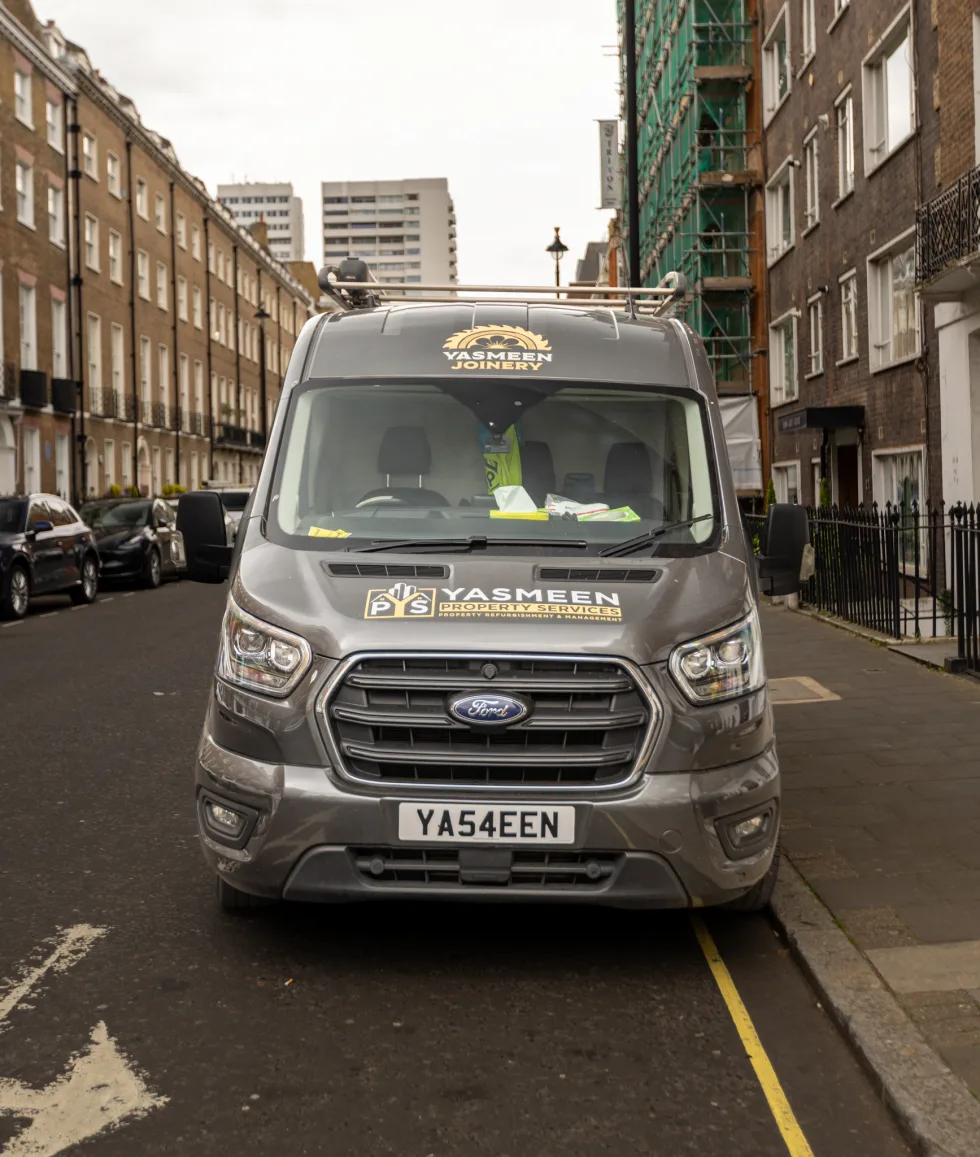 Yasmeen branded work van parked on a London street