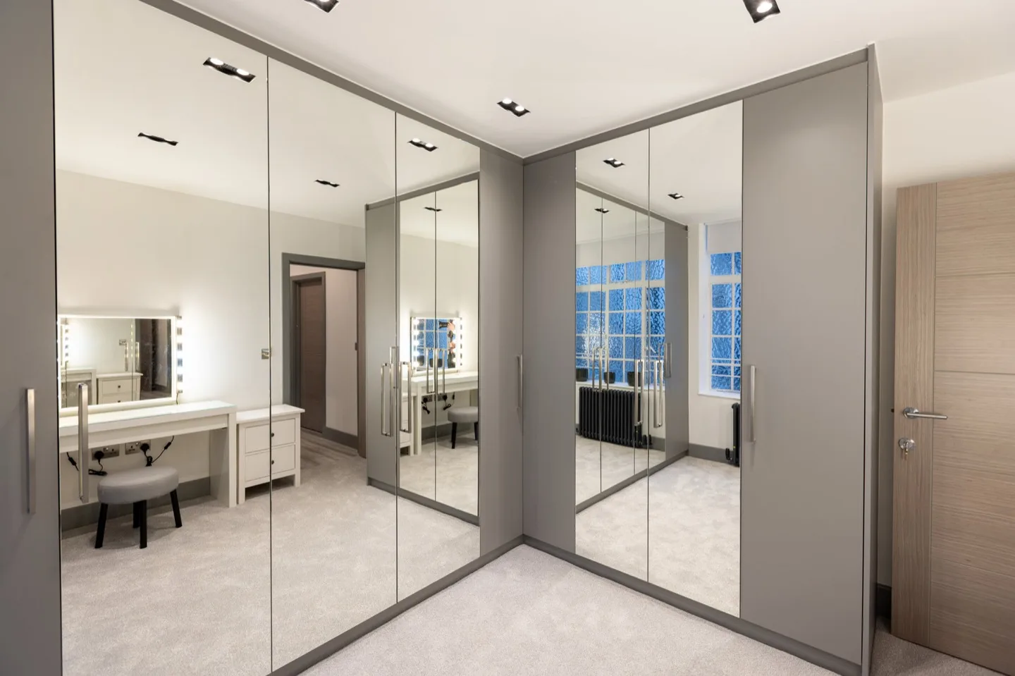 Walk wardrobe l shaped mirrored doors vanity — Kensington